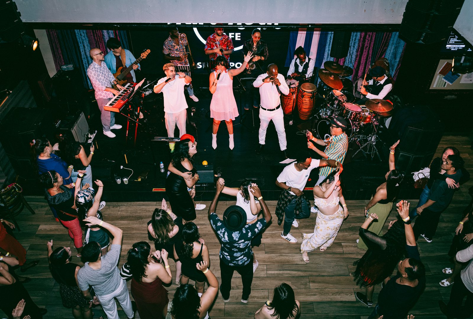 Havana Social Club — full band on stage with crowd dancing Singapore